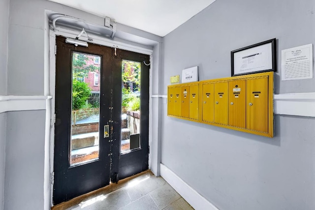 entryway featuring mail boxes