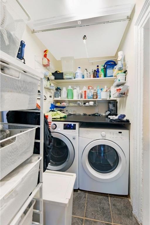 clothes washing area featuring washing machine and dryer