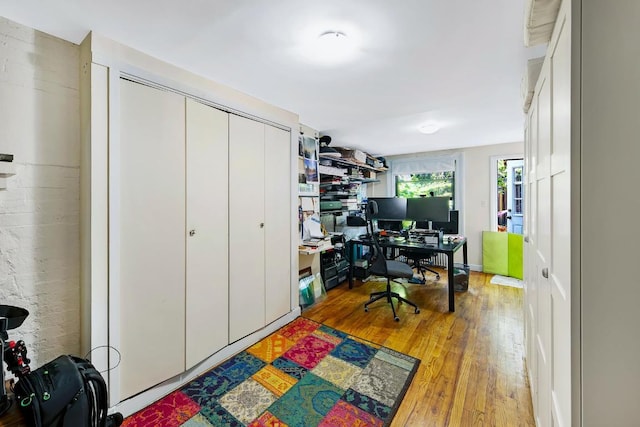 office space with light wood-type flooring