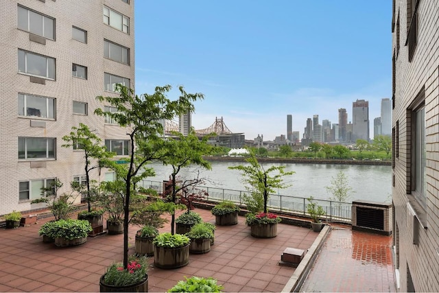 view of patio / terrace with a water view