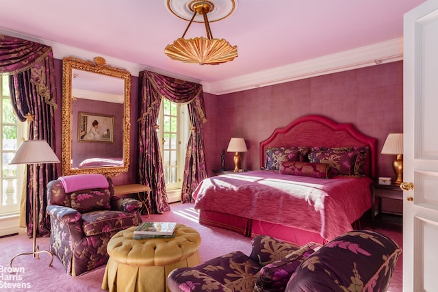 11 E 74th St, New York City, NY 10021 - bedroom with ornamental molding, carpet floors, wallpapered walls, and access to outside