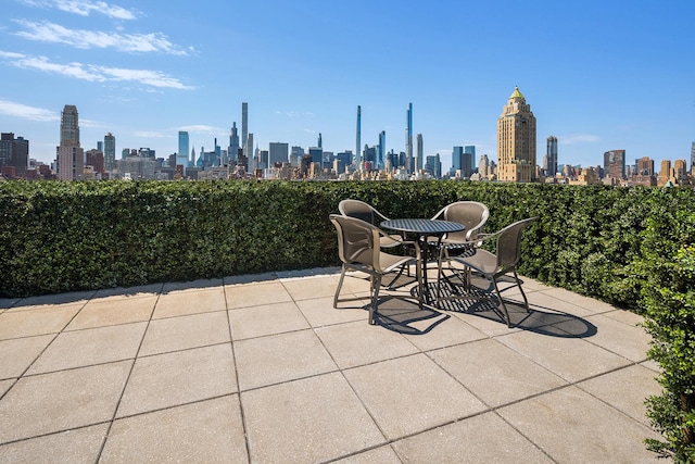 view of patio with a city view