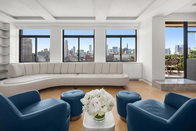 living room with light hardwood / wood-style flooring and built in features