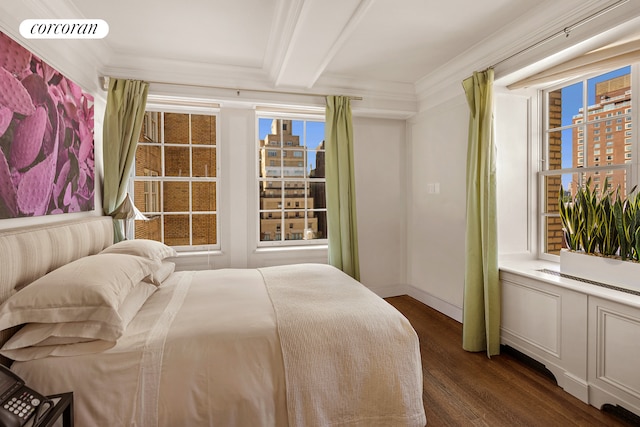 bedroom featuring beam ceiling, dark wood-type flooring, and ornamental molding