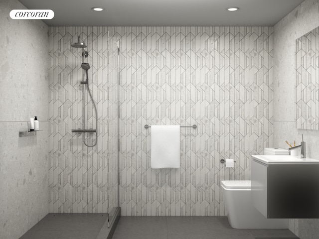 bathroom featuring tile patterned floors, vanity, a shower, tile walls, and toilet