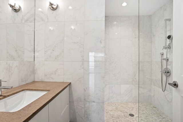 5 W 120th St Unit 1, New York City, NY 10027 - bathroom featuring recessed lighting, a walk in shower, and vanity