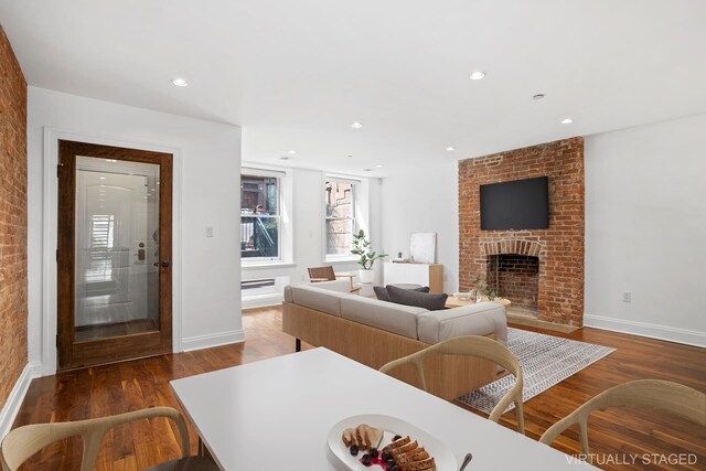 5 W 120th St Unit 1, New York City, NY 10027 - living room with a fireplace, wood finished floors, recessed lighting, and baseboards