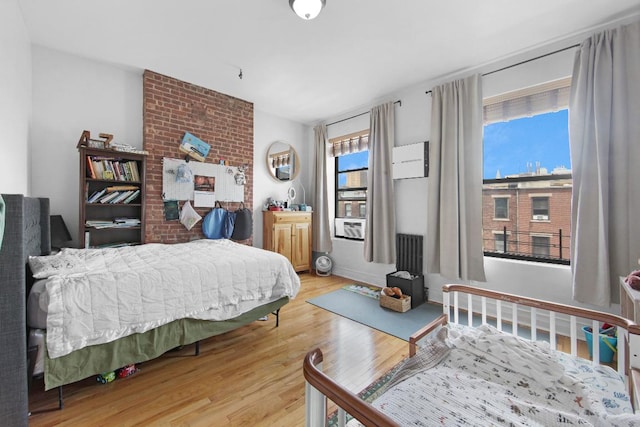 bedroom featuring light hardwood / wood-style flooring