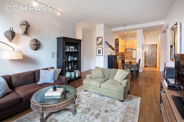 living room with wood finished floors