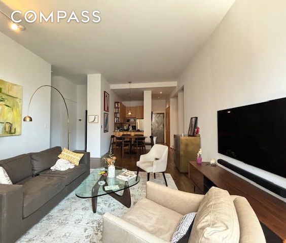 living room with wood-type flooring