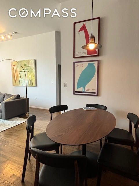 dining room featuring hardwood / wood-style flooring