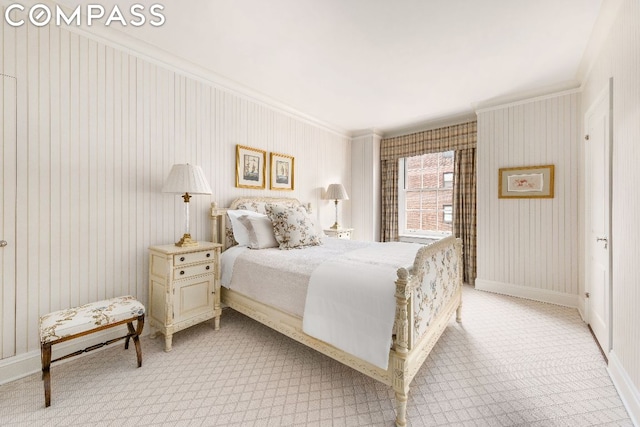 bedroom featuring crown molding