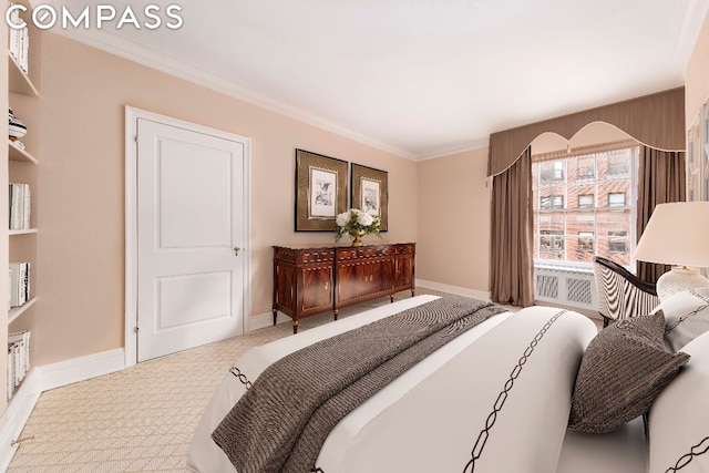 carpeted bedroom featuring crown molding