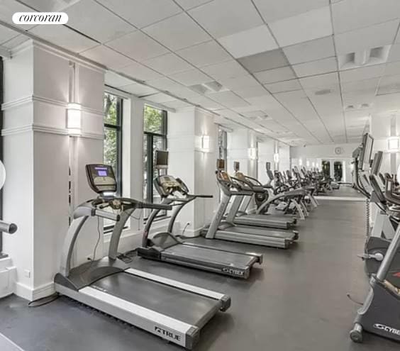 workout area with a drop ceiling