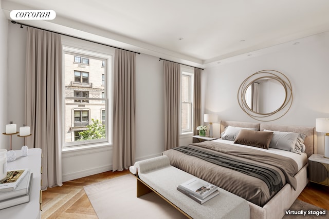 bedroom with visible vents and baseboards