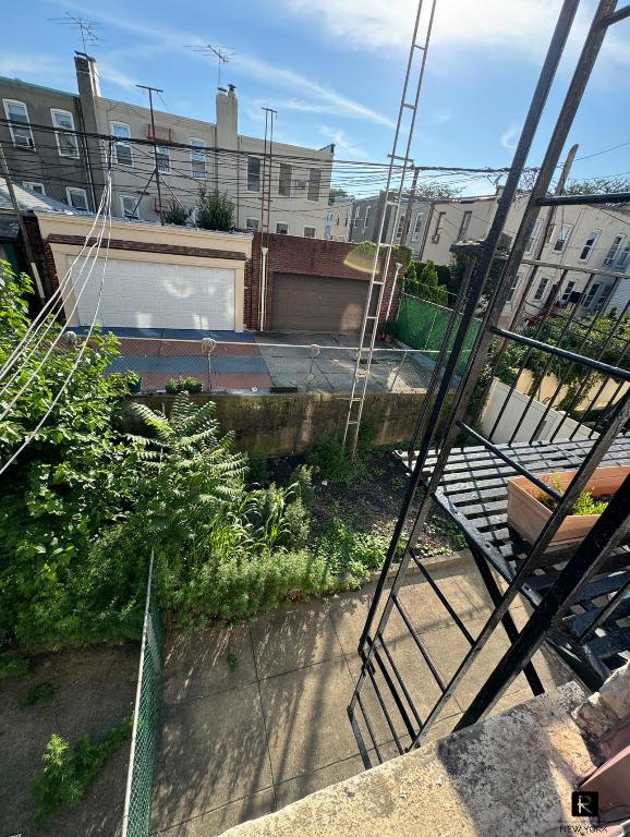 view of gate featuring fence