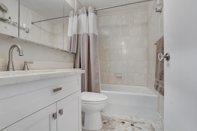 full bathroom with toilet, vanity, and shower / bath combination with curtain