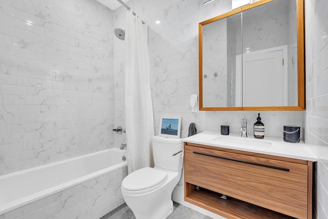 bathroom featuring toilet, tiled shower / bath combo, vanity, tile walls, and backsplash