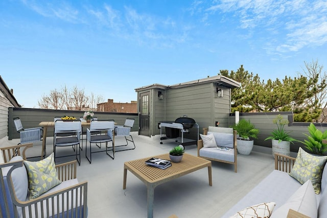 view of patio featuring a grill and outdoor lounge area