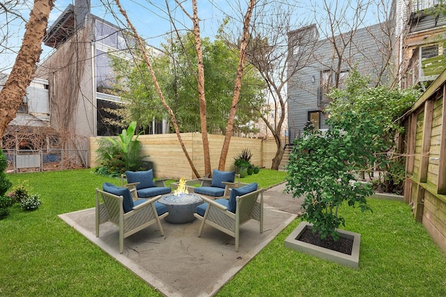 view of patio with a fire pit