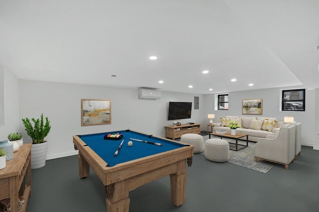 rec room featuring a wall mounted AC, concrete floors, and billiards