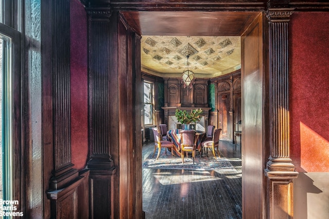 dining space with wood-type flooring