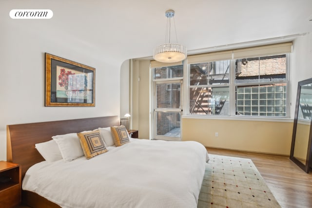 bedroom with light wood-type flooring