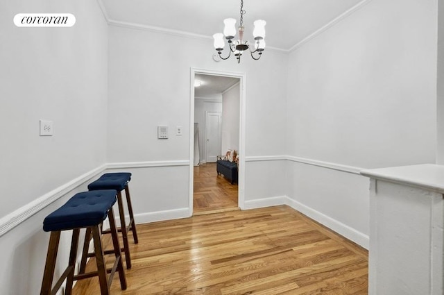 dining area featuring baseboards, parquet flooring, visible vents, and crown molding