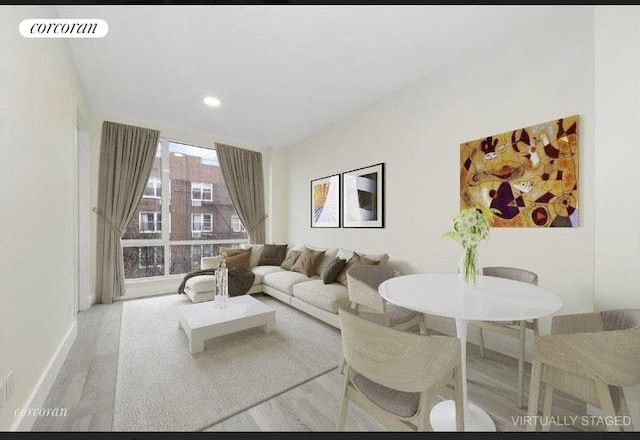 living room featuring light hardwood / wood-style floors