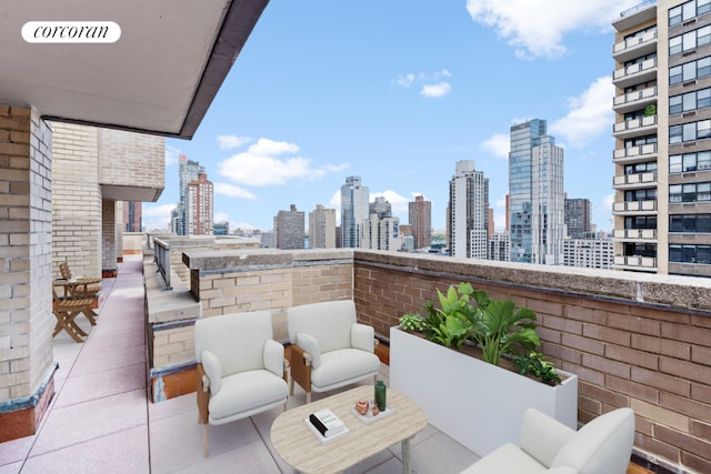 view of patio with a balcony