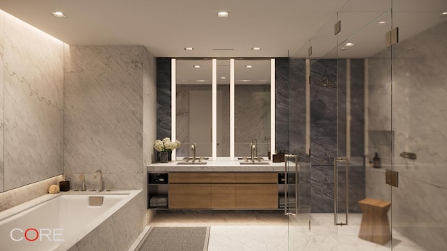 bathroom with vanity, separate shower and tub, and tile walls