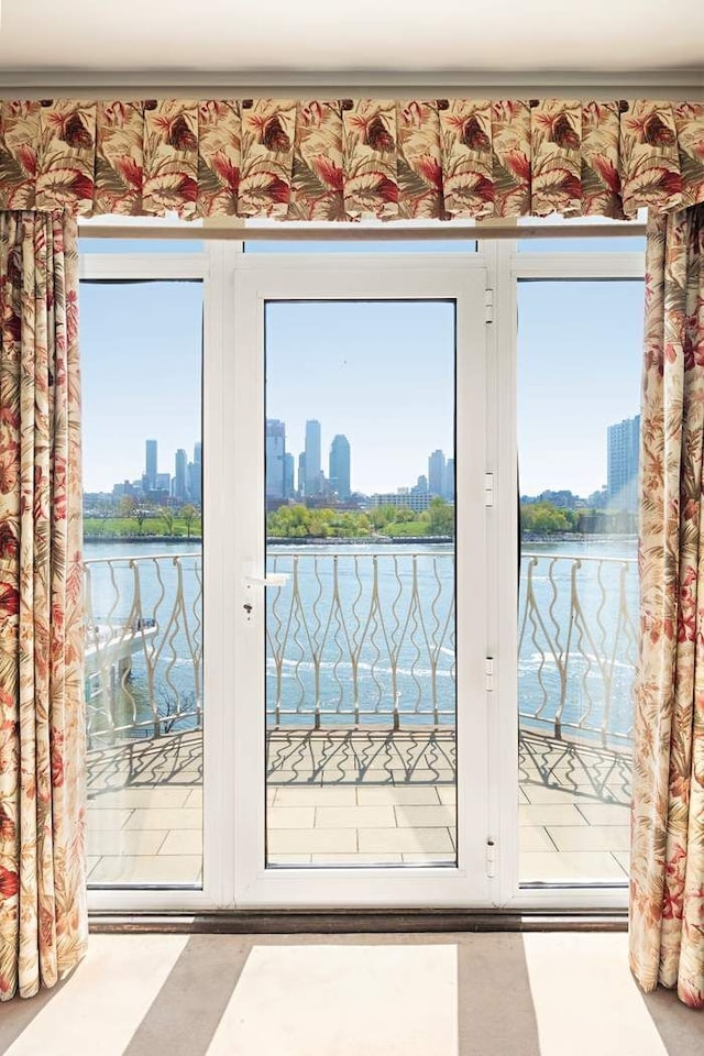 435 E 52nd St Unit 2/3F, New York City, NY 10022 - doorway to outside with a water view and a view of skyline