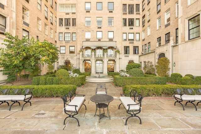 surrounding community with a patio area