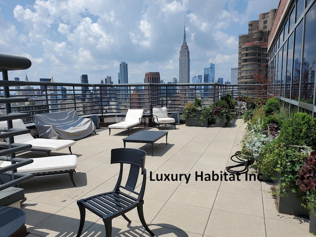 view of patio / terrace with a city view