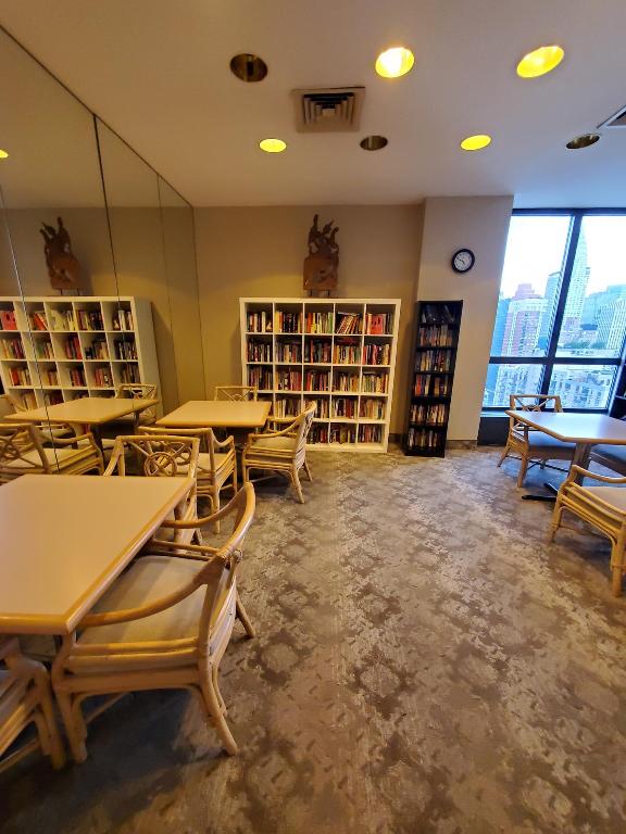 interior space featuring visible vents and bookshelves