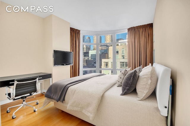 bedroom featuring hardwood / wood-style floors