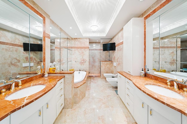 bathroom featuring tile walls, ornamental molding, a bath, and a sink