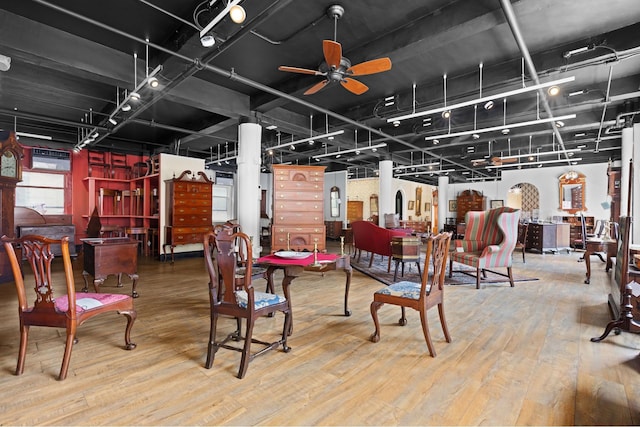 interior space featuring ceiling fan and wood finished floors