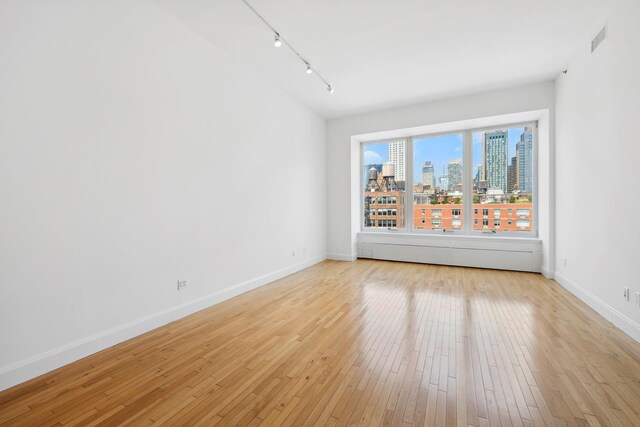 empty room featuring light wood-type flooring