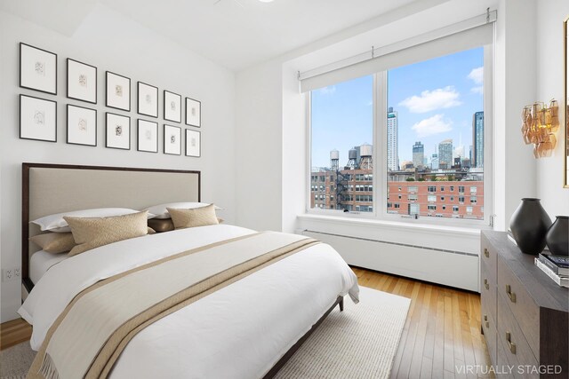 unfurnished room featuring light hardwood / wood-style flooring