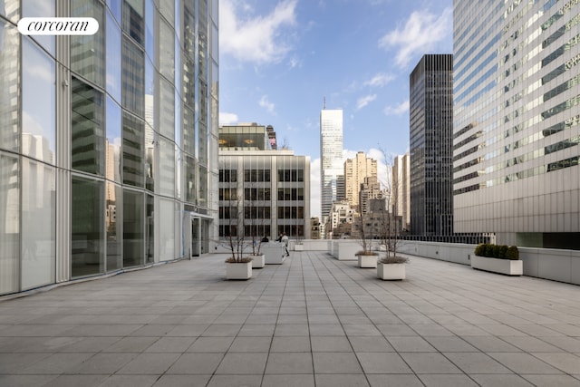 view of property's community featuring a patio area