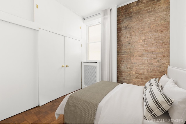 357 W End Ave Unit 3, New York City, NY 10024 - bedroom featuring brick wall and a closet