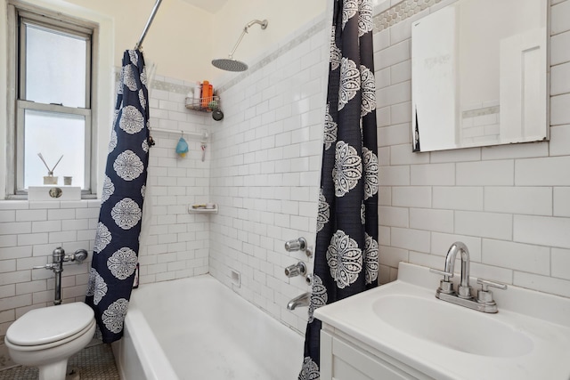 bathroom featuring toilet, tile walls, shower / bath combo, and vanity