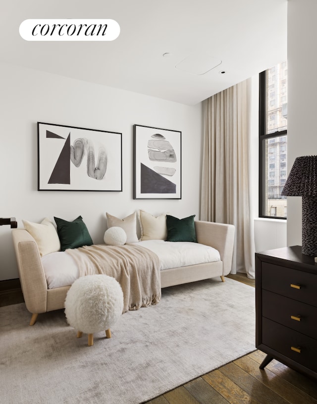 bedroom with dark wood-type flooring