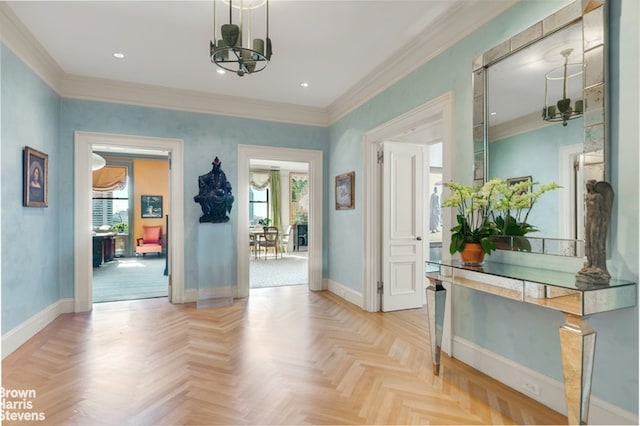 interior space with a notable chandelier, crown molding, and light parquet flooring