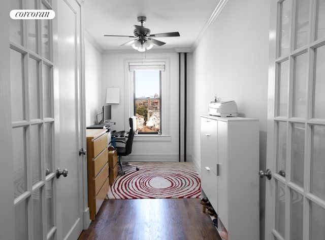 office featuring dark wood-type flooring, ornamental molding, and ceiling fan