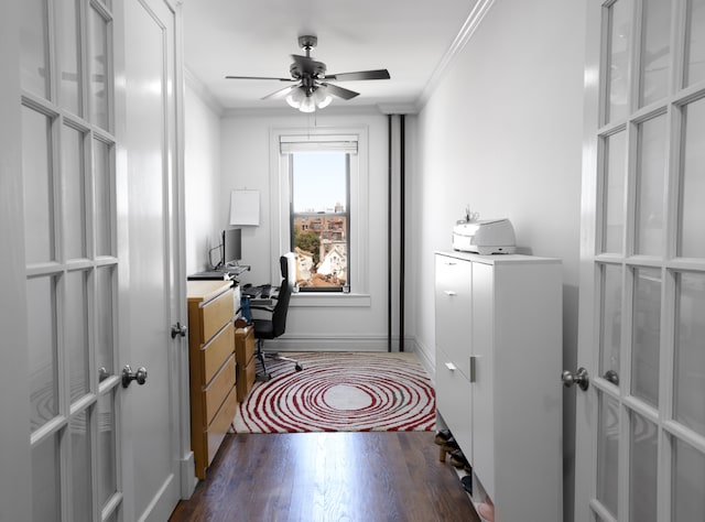 office space with ornamental molding, dark wood-type flooring, and ceiling fan