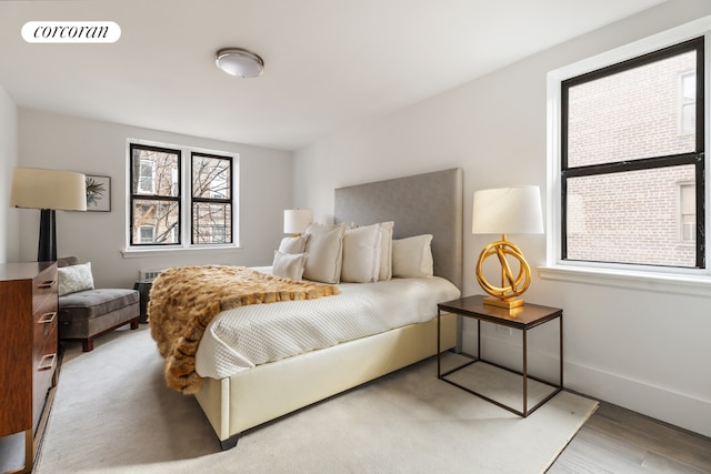 bedroom featuring hardwood / wood-style flooring