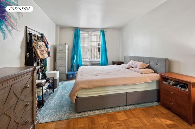 bedroom featuring light parquet flooring