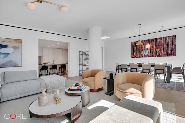 living room with light parquet floors